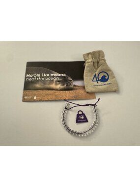 4ocean Heal The Ocean Seal Beaded Bracelet Clear Plastic Cord Adjustable EB3